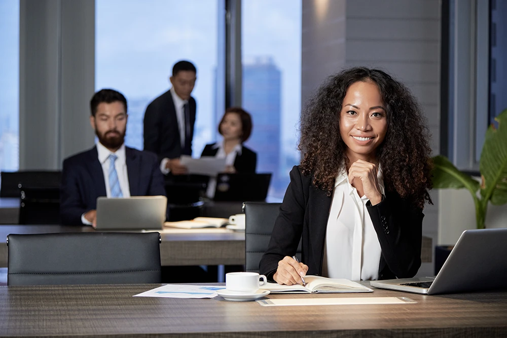 Executive professional in modern office setting - example of senior leadership talent recruited by Dallas executive search specialists