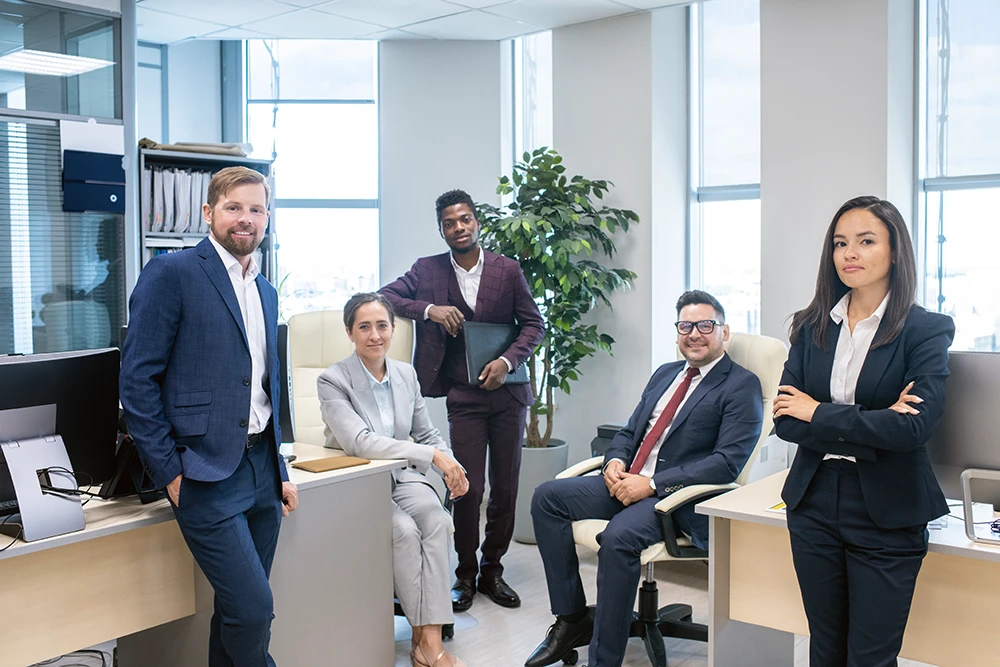 Professional executive team in modern Dallas office environment - representing the caliber of leadership talent placed by G.A. Rogers & Associates executive search