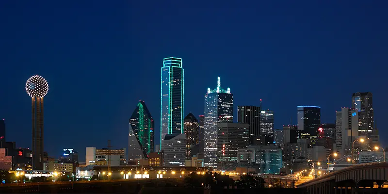 Dallas skyline at night representing the local staffing agency market