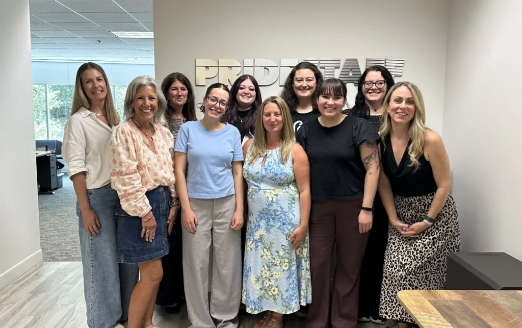The PrideStaff Dallas team together in our Dallas office